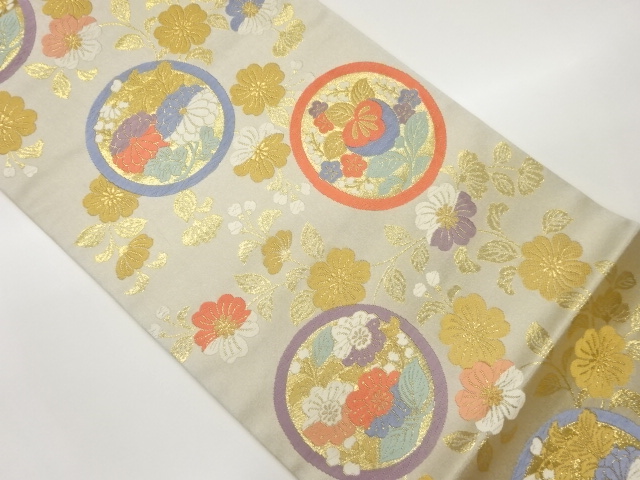 丸文に橘・菊・草花模様織出し袋帯